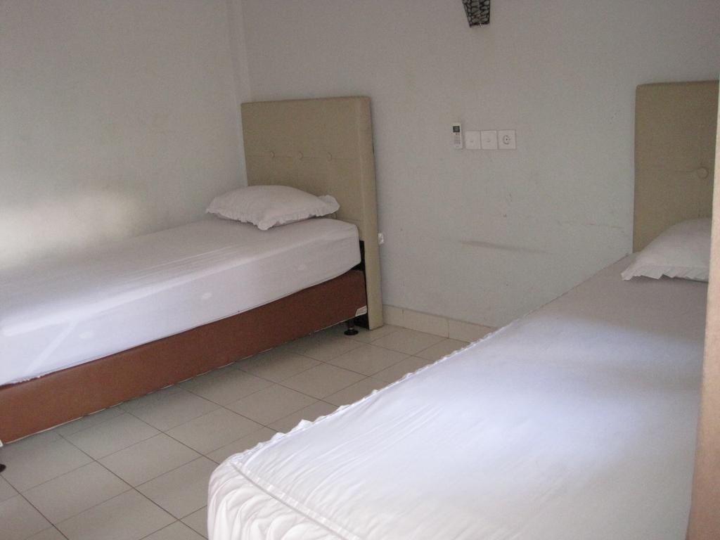 Taman Mekar Beach Inn Kuta Lombok Quarto foto